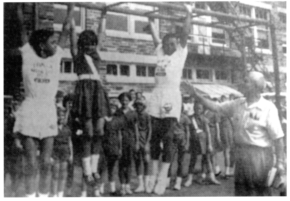 Children playing on the monkey bars. PPS Archives