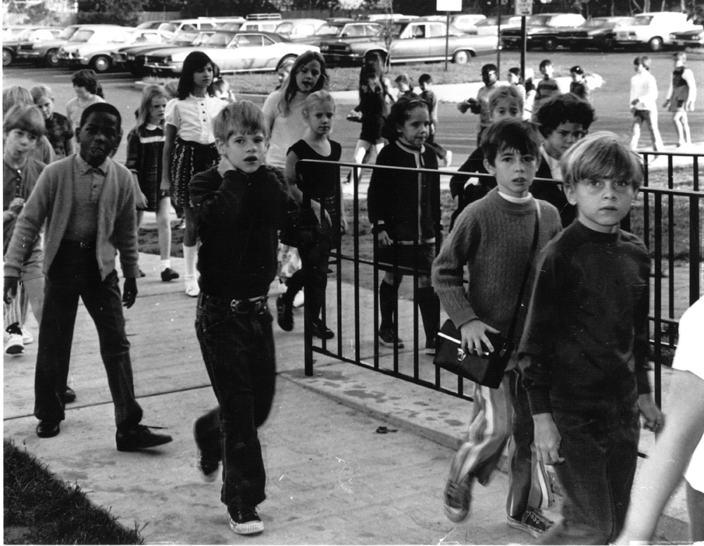 Elementary school children head to school. PPS Archives. 